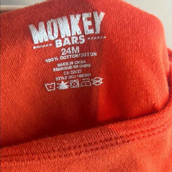 Vibrant Red Bodysuit One Piece with Playful Print - Picture 2 of 3